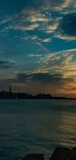 Scenic ocean sunset with vibrant sky and dark blue water.