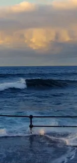 Tranquil ocean view at sunset with waves crashing.