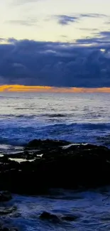 Serene ocean view with sunset and vibrant clouds in mobile wallpaper.