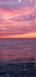 Serene ocean sunset with pink sky and calm waters on mobile wallpaper.