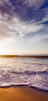 Mobile wallpaper featuring a serene sunset over a calm ocean with waves.