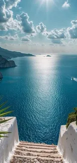 Serene ocean view with sunlit water and lush greenery.