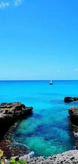 Serene ocean view with blue waters and rocky cliffs in mobile wallpaper.