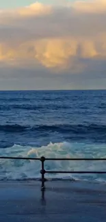 Serene ocean view with calm waves and a twilight sky.