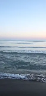 Calm ocean view with gentle waves and blue sky