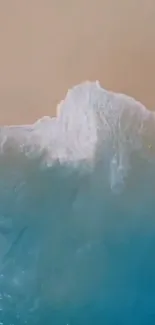 Serene view of ocean wave crashing gently onto a sandy beach.