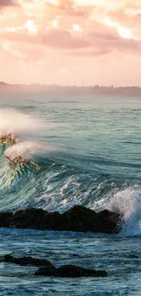 Serene ocean wave wallpaper with sunset and rocks.