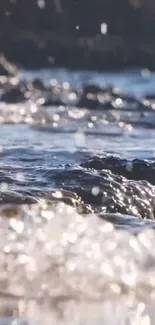 Close-up of serene ocean waves with sunlight reflections.