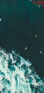 Aerial view of dark ocean waves with surfers.