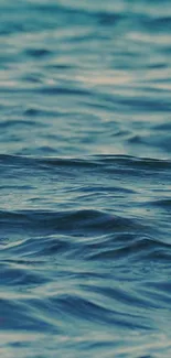 Calming ocean waves under the blue sky.