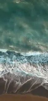 Aerial view of serene ocean waves and shoreline.