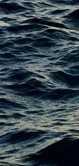 Dark ocean waves create a calming mobile wallpaper backdrop.