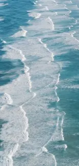 Ocean waves crashing gently on the beach with a calming blue hue.