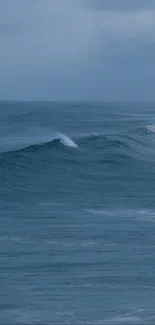 Serene ocean waves under a clear sky.