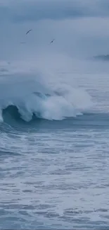 Calming blue ocean waves with cloudy sky.