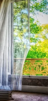 Open window with curtains overlooking green landscape.