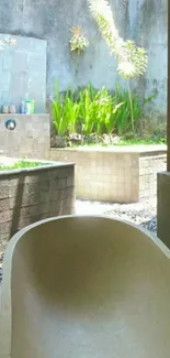 Serene outdoor bathroom with greenery and natural elements.