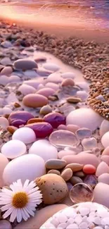 Beach with colorful pebbles at sunset