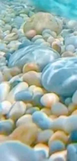 Serene underwater view of pebbles on a calm beach with light blue hues.