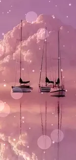 Serene pink clouds and sailboats reflecting on a calm sea wallpaper.