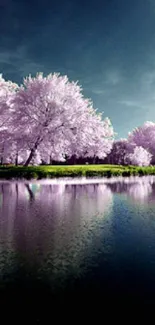 Serene wallpaper of a pink tree-lined lake landscape with reflections.