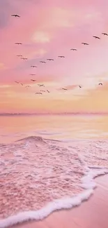 Pink ocean sunset with waves and flying birds in a serene setting.