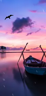 Calm water scene with pink sunset, boat, and bird.