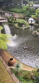 Serene pond garden view with lush greenery and a small waterfall.