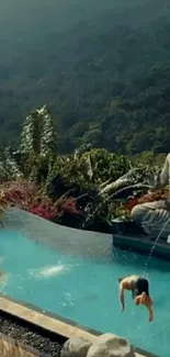 Tranquil poolside with a Buddha statue and lush mountain landscape.