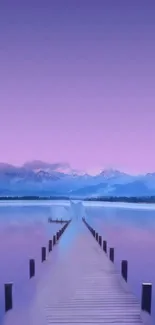 Serene purple lake with mountains and pier.