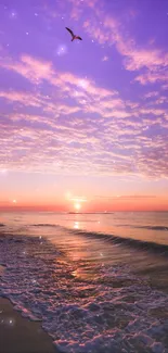 Purple sunset over ocean with bird and waves.