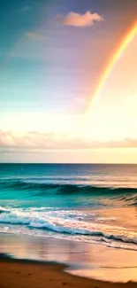 Serene beach wallpaper with rainbow and sunset.