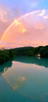 Rainbow reflecting over a tranquil lake.