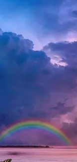 Vibrant purple sky with a rainbow arch.