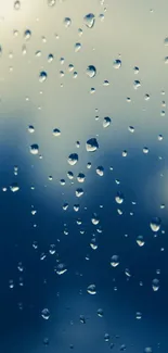 Raindrops on a window with a calming blue background for mobile wallpaper.