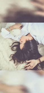 Woman peacefully sleeping on a beige cozy bed with soft textures.