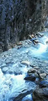 Tranquil river flowing through rocky terrain with blue-gray hues.