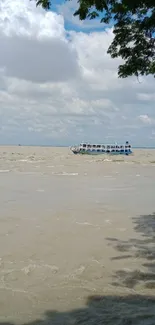 Calm river with boat and cloudy sky.