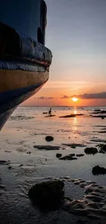 Tranquil seaside sunset with boat and horizon.