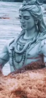 Serene Lord Shiva statue amidst rushing river water.