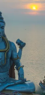 Wallpaper of Lord Shiva at sunset over the ocean, showcasing peace and spirituality.