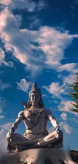 Lord Shiva meditating under a blue sky with clouds and greenery.