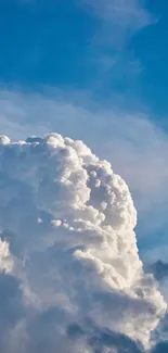 Fluffy white clouds against a bright blue sky wallpaper for mobile.