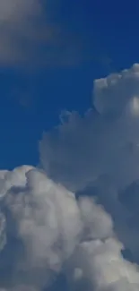 Serene clouds against a blue sky.