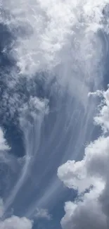 Serene sky with wispy clouds and a deep blue background.