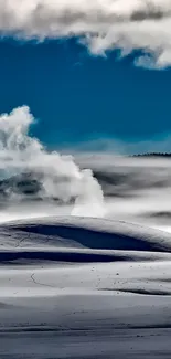 Serene snowy landscape with blue sky and clouds.