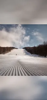 Beautiful snowy mountain landscape under a bright, clear sky.