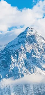 Snowy mountain peak with blue sky, perfect for a serene mobile wallpaper.