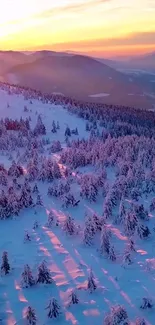 Snowy mountain landscape during sunrise with pink hues.