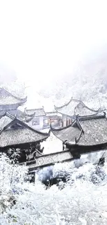 Serene snowy village with traditional Asian architecture.